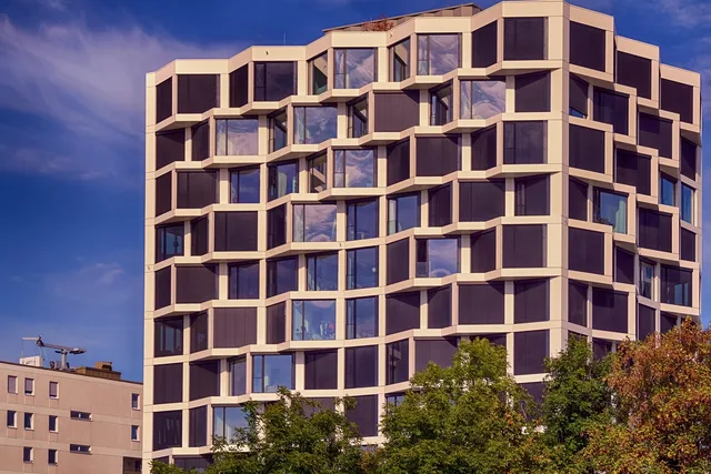 architecture, building, facade, exterior, windows, modern building, office building, urban, downtown, city, real estate, munich, germany. What governs a commercial lease: four layers from the document to local rules