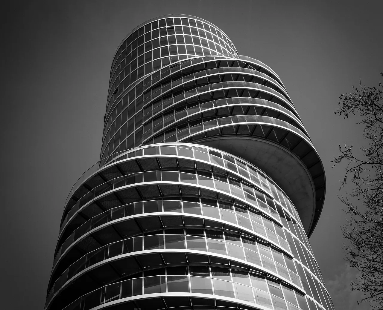 architecture, tower, office building, building, skyscraper, facade, glass front, modern, modern architecture, skyline, real estate, glass facade, bochum, eccentric tower, black-and-white, futuristic, commercial building, city, real estate, real estate, real estate, real estate, real estate. Coworking space: what a license agreement gives you
