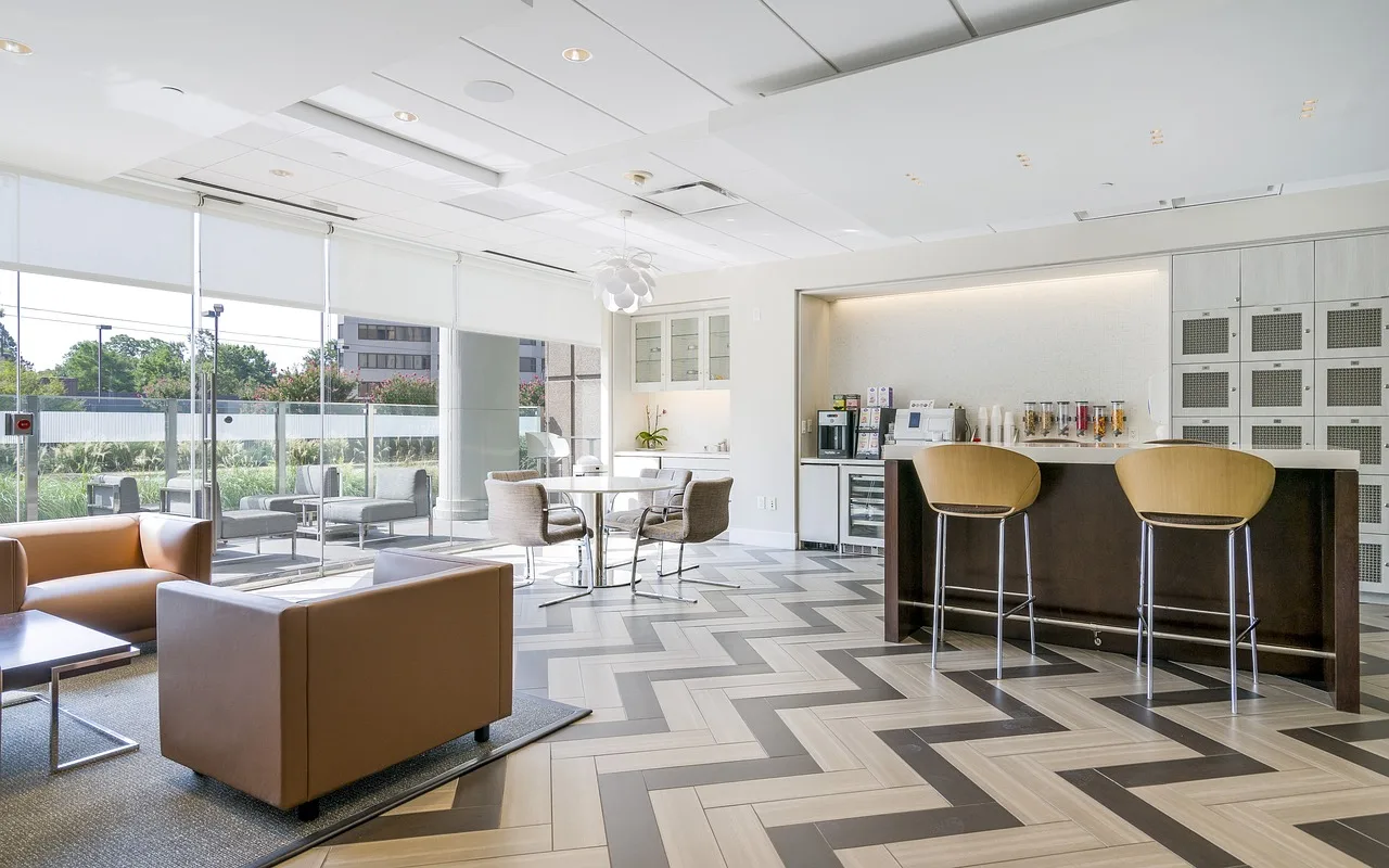 lounge, office, work, break room, morning, breakfast, lounge, lounge, lounge, lounge, break room, break room, break room, break room, break room. Why an office of the same size can hold very different headcounts