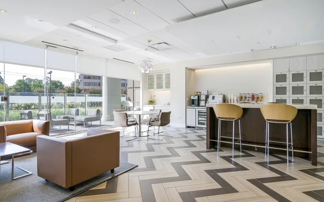 lounge, office, work, break room, morning, breakfast, lounge, lounge, lounge, lounge, break room, break room, break room, break room, break room. Why an office of the same size can hold very different headcounts