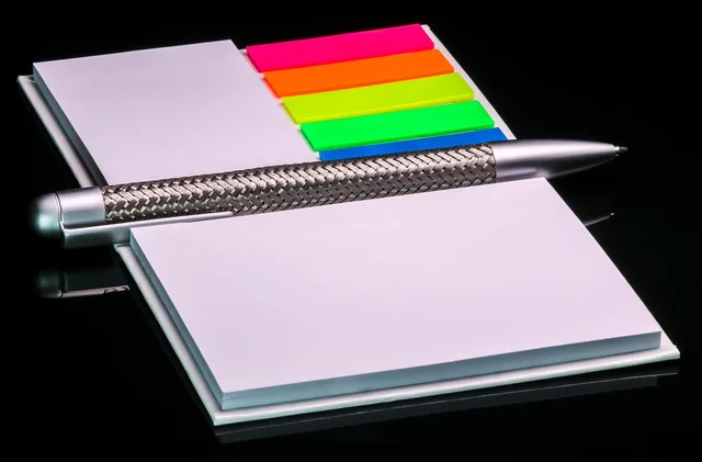 office, writing pad, notes, ballpoint pen, block, paper, multicoloured, self-adhesive, note, notepad, postit, stickies, write, business, copy space, table, empty, sticky notes, metal, white, silver. Office space checklist: every item, with the reason behind it