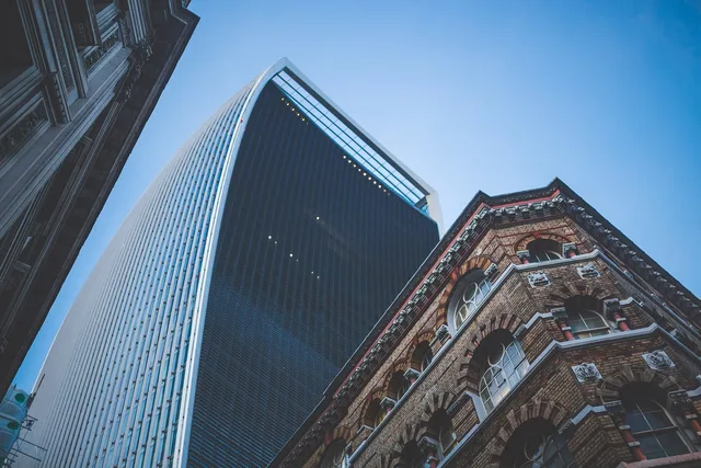 architecture, building, infrastructure, glass, windows, skyscraper, story, blue. Seismic retrofit commercial lease requirements: who pays?